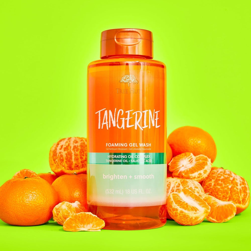 Tree Hut held in hand to show 18 fl oz size and travel-friendly benefit
