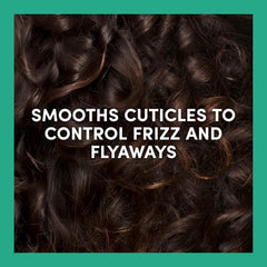 TRESemmé applied to damp curls improving detangling and defined bounce
