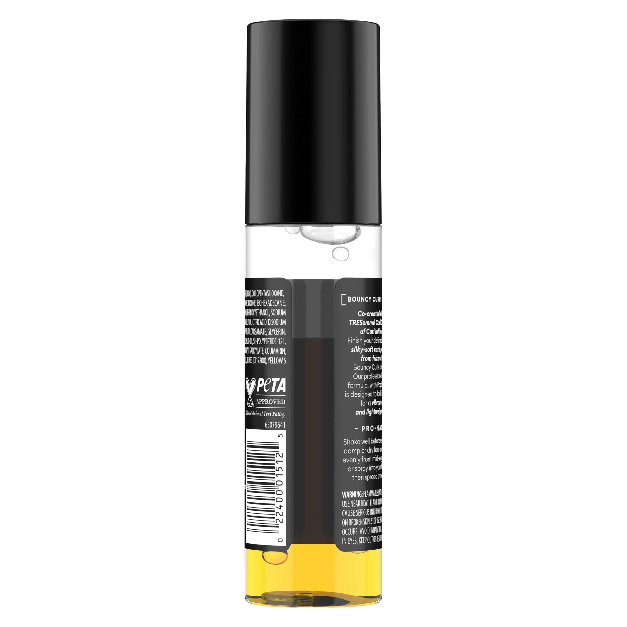 TRESemmé mist being shaken to blend phases for consistent hydration and shine