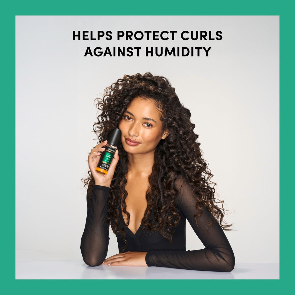 TRESemmé close-up oil droplet texture illustrating smoothing benefits for cuticles
