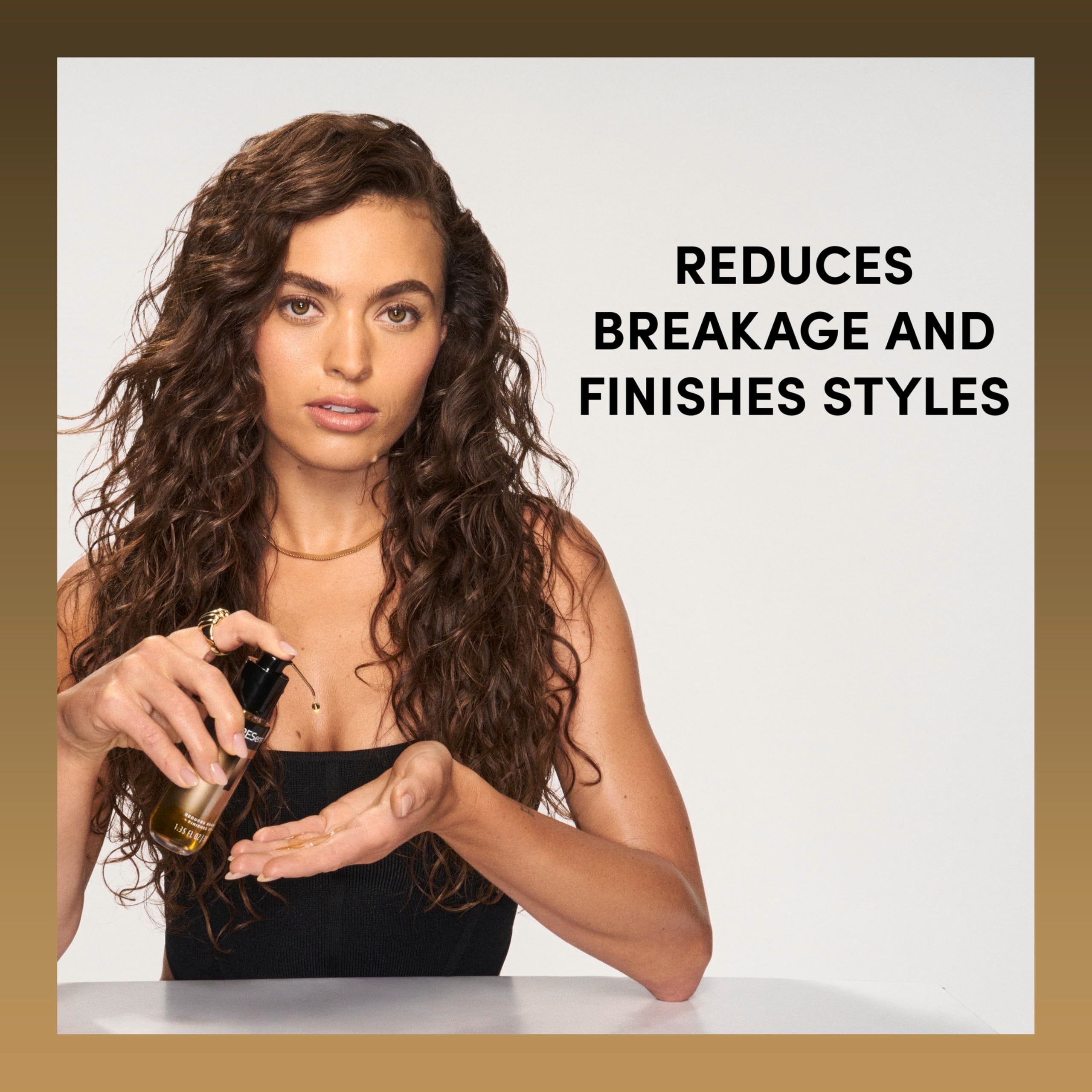 TRESemmé applying oil to damp hair for smoother blow-drying