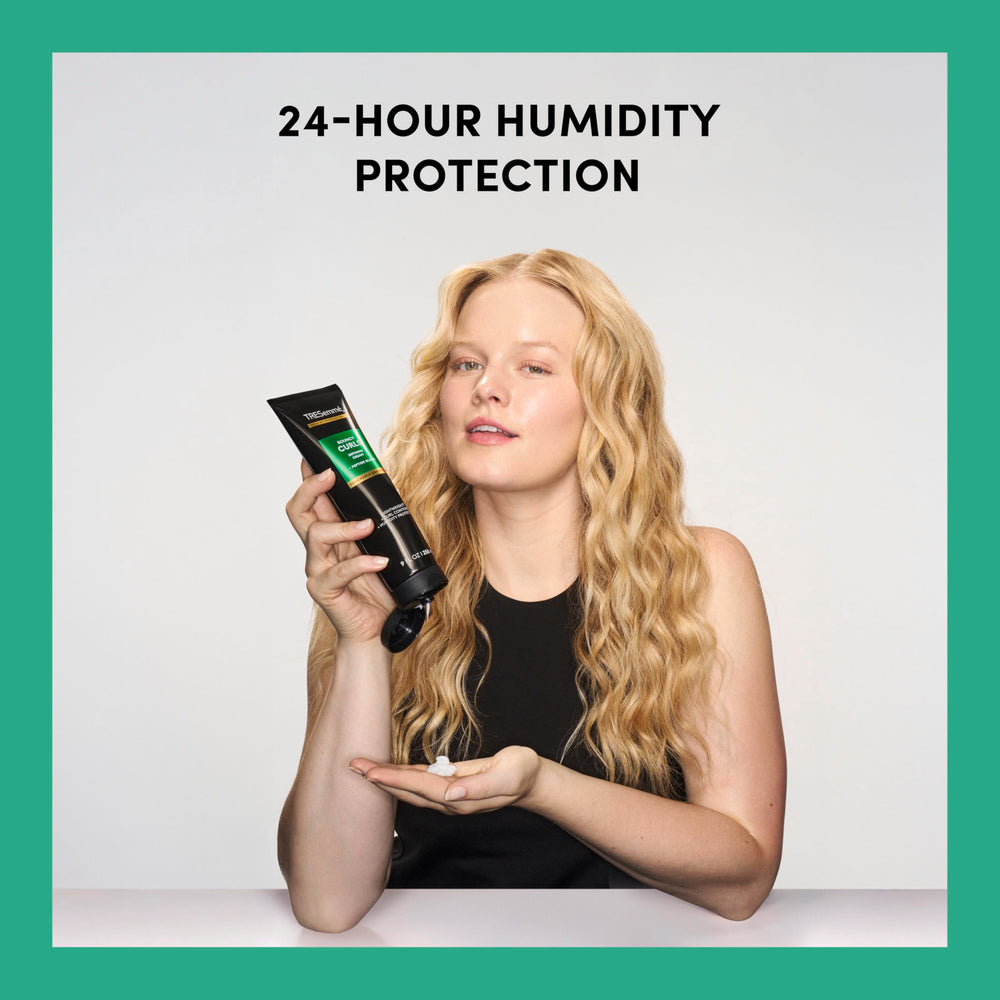 TRESemmé in-hand application demonstrating even distribution for defined curls