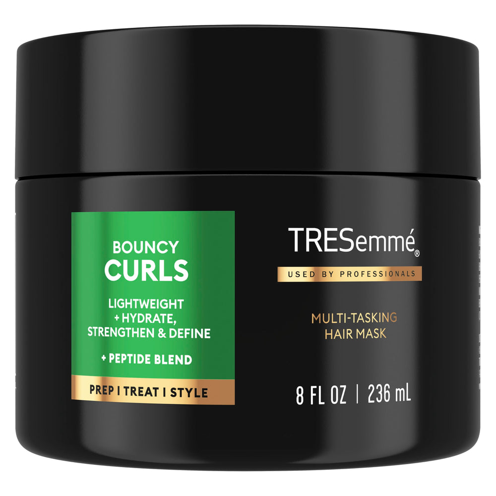 TRESemmé front packaging showing product and benefit of defined curls