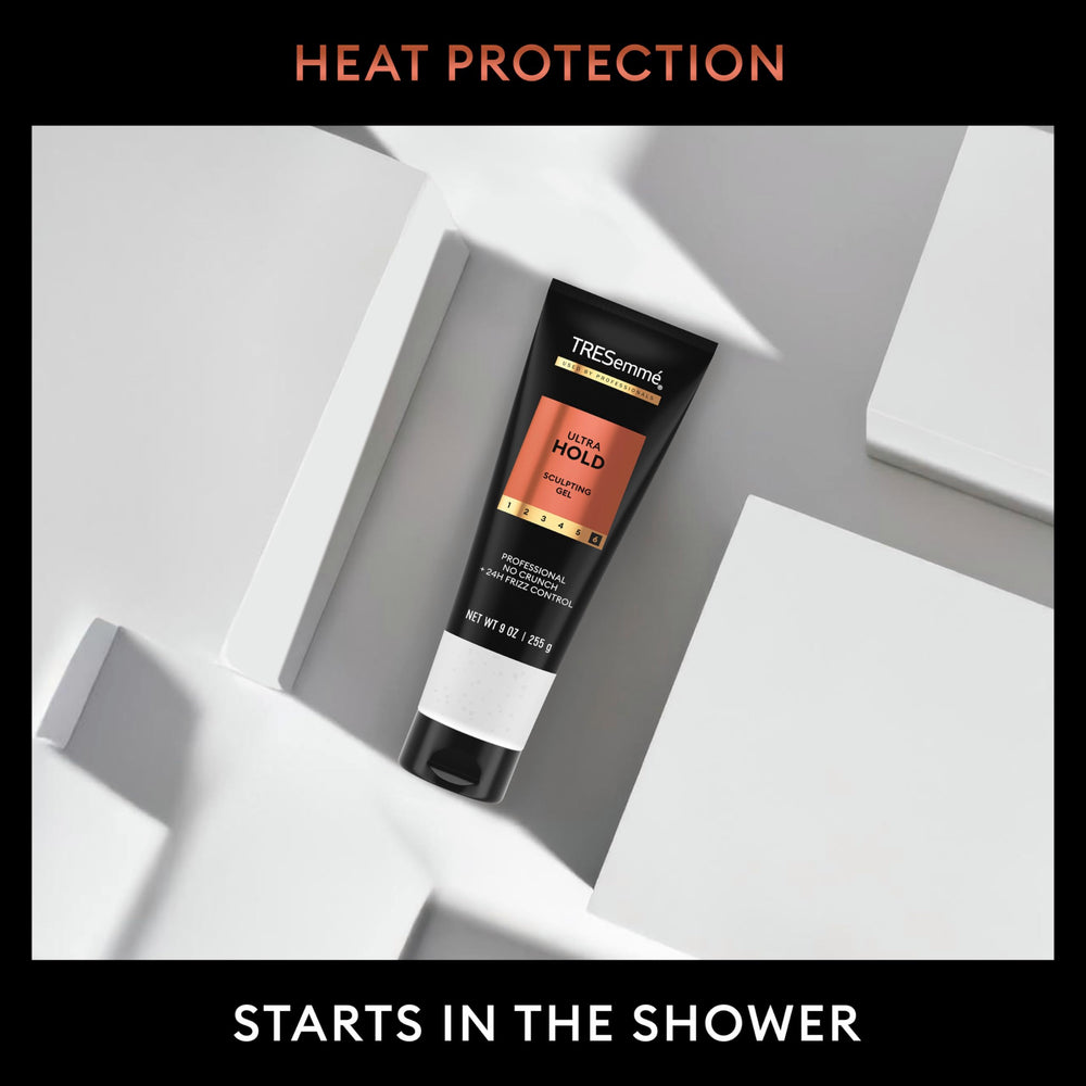 TRESemmé gel on bathroom counter next to styling tools showing daily routine compatibility benefit