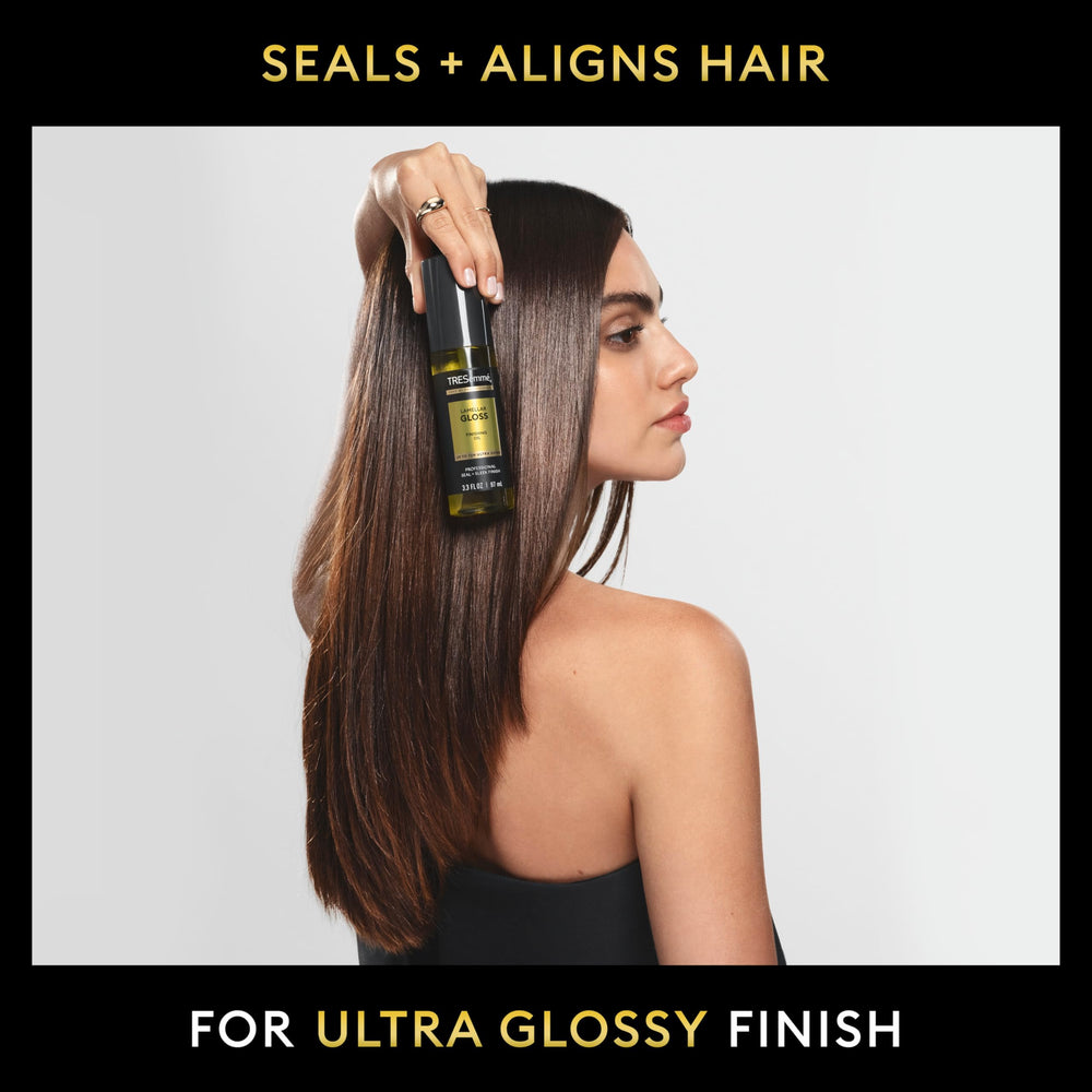 TRESemmé being applied to damp hair to seal cuticles and reduce frizz