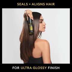 TRESemmé being applied to damp hair to seal cuticles and reduce frizz