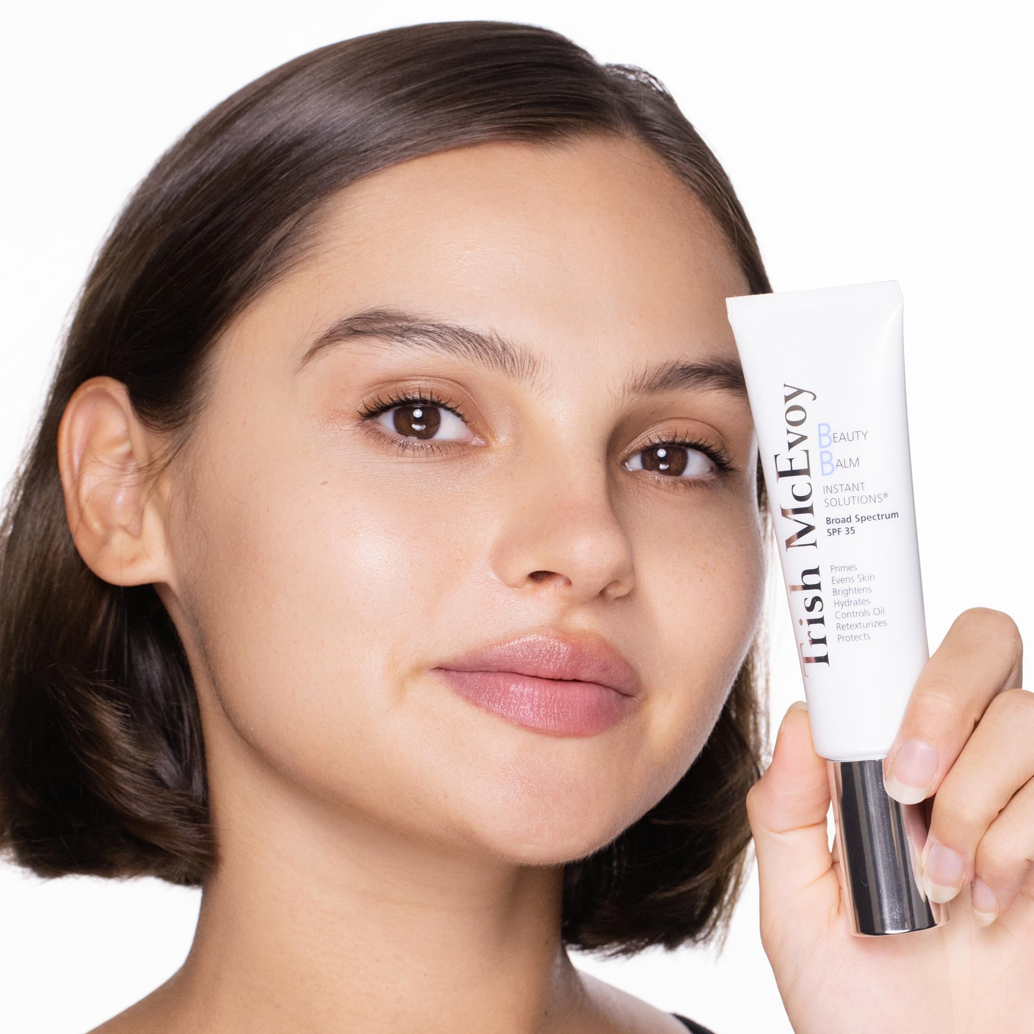 Trish McEvoy Beauty Balm inside a cosmetic bag for streamlined routine benefit
