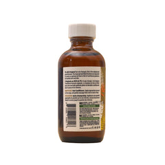 Tropic Isle Living 59ml next to coin showing compact travel-friendly benefit