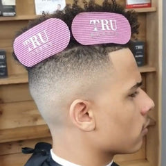 TRU BARBER clip in hand demonstrating compact size for easy portability