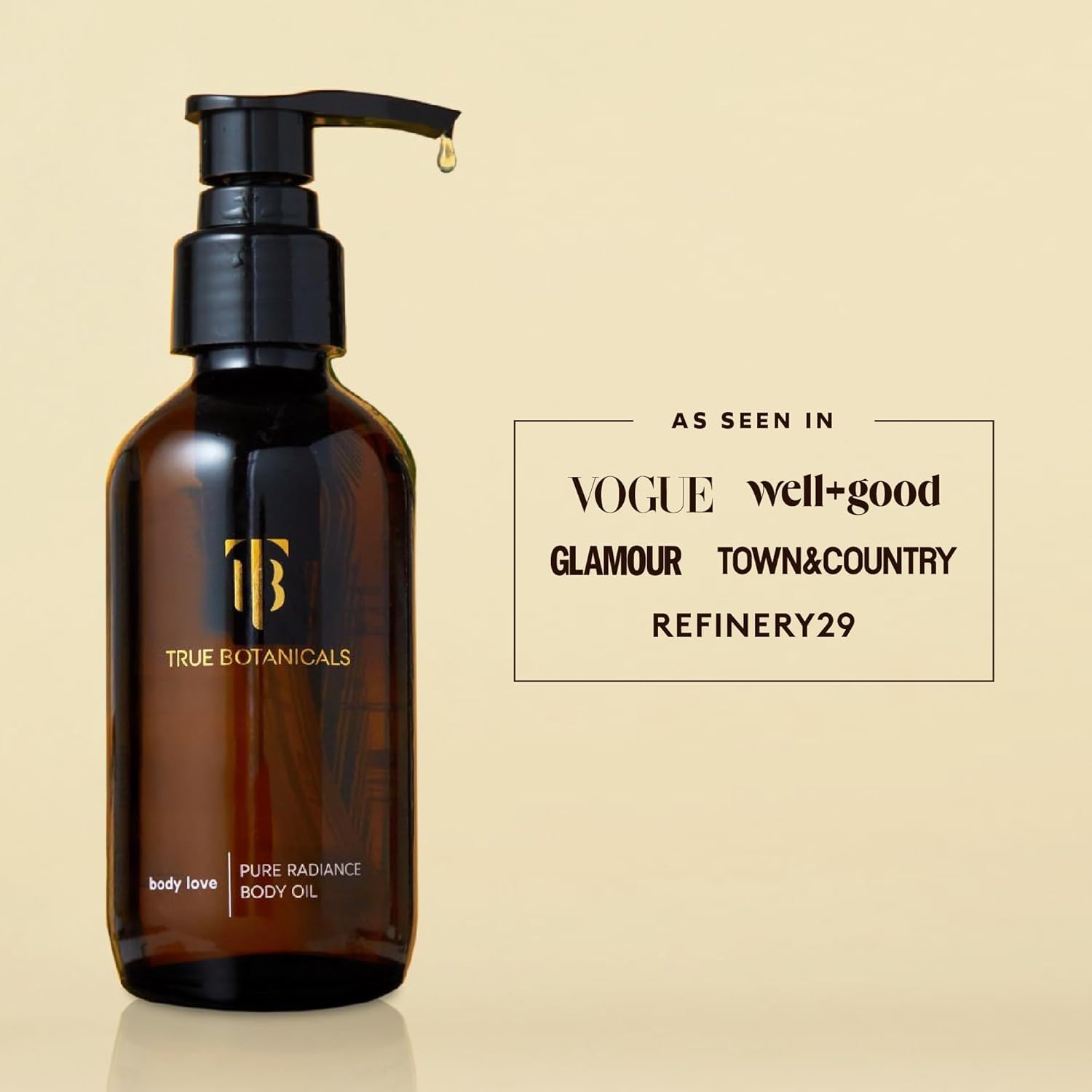 Bottle beside towel for size comparison showing True Botanicals travel-friendly volume