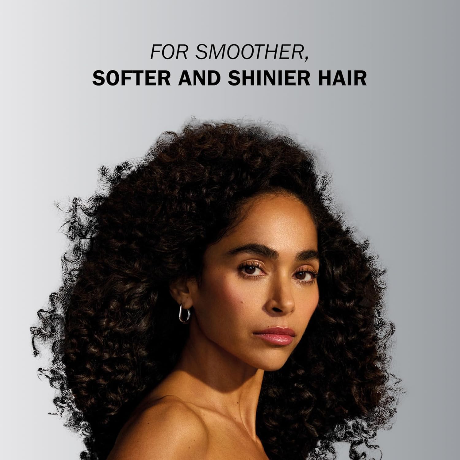 TRUSS creamy conditioner texture close-up highlighting smoothing action