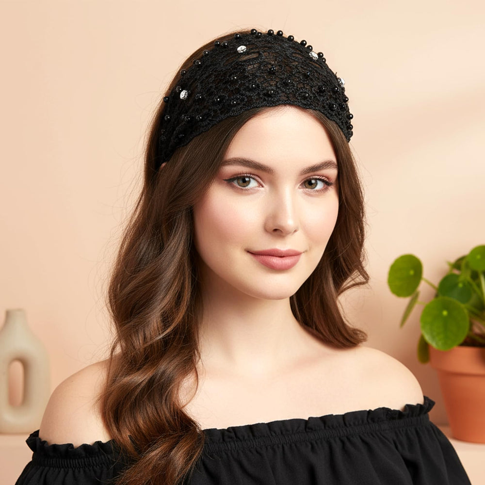 Tucnoeu headband on hand for scale showing true size and lightweight travel-friendly benefit