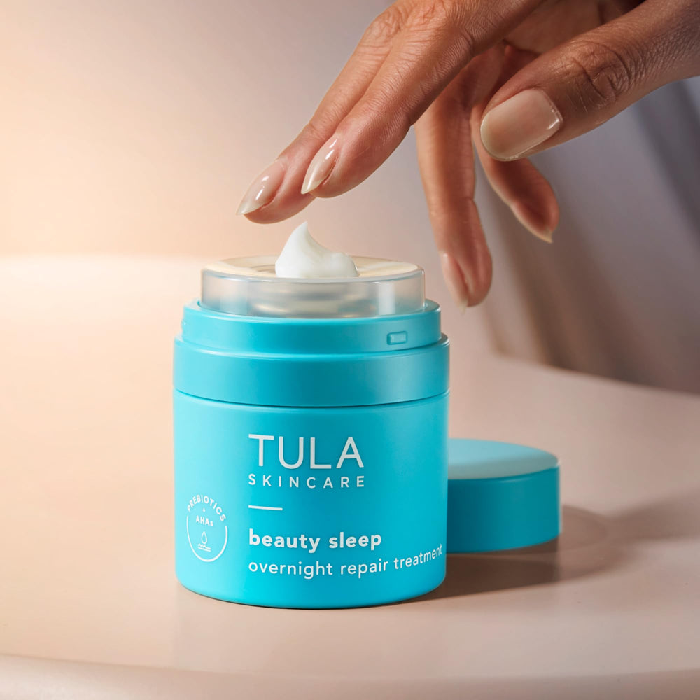TULA ingredient flatlay with peptides and vitamin C illustrating active benefits