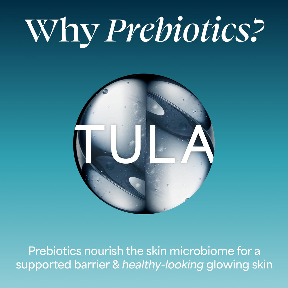 TULA bottle held next to a hand to show 1 fl oz size and portability