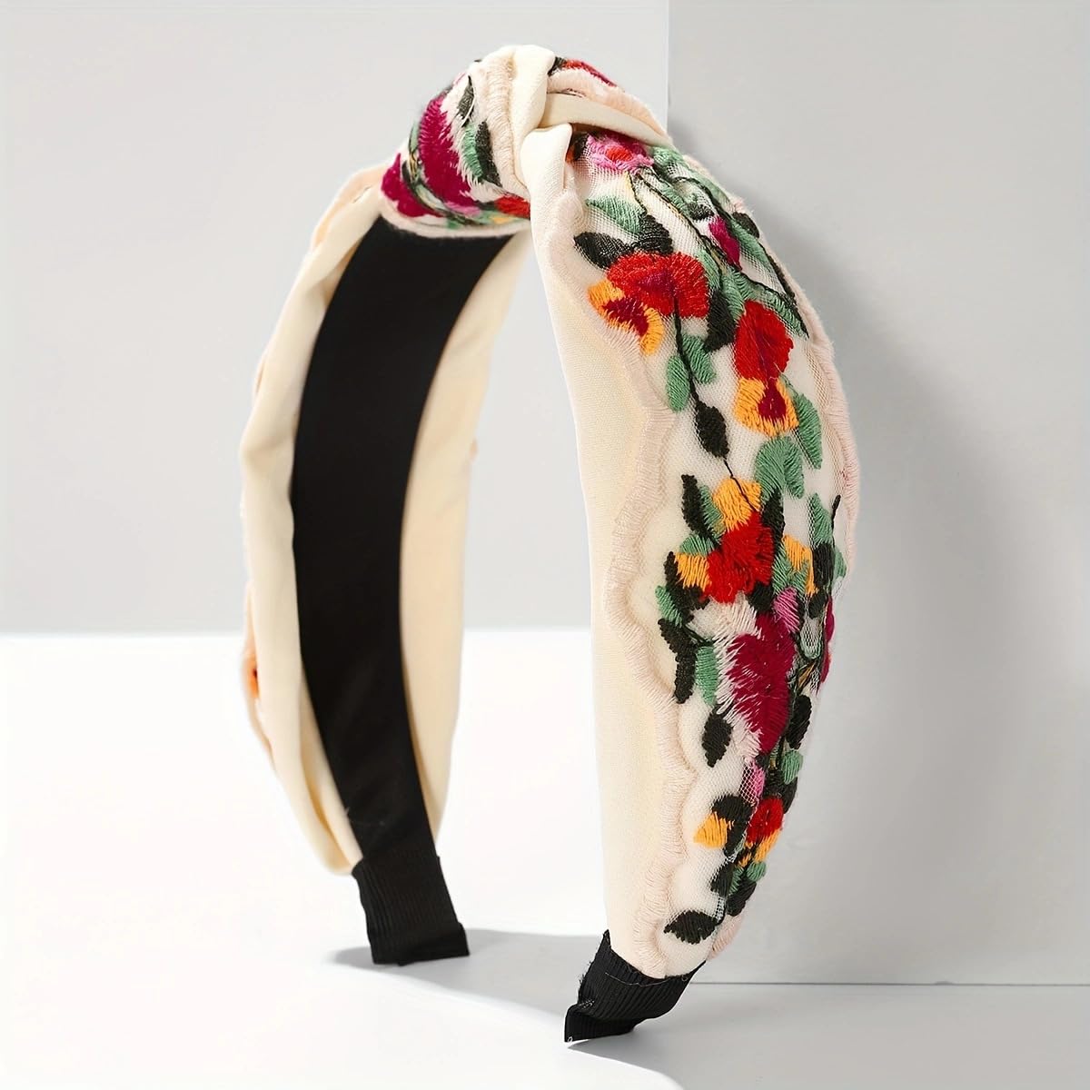 TURTLEDOVE headband styled with bun demonstrates easy hairstyling benefit
