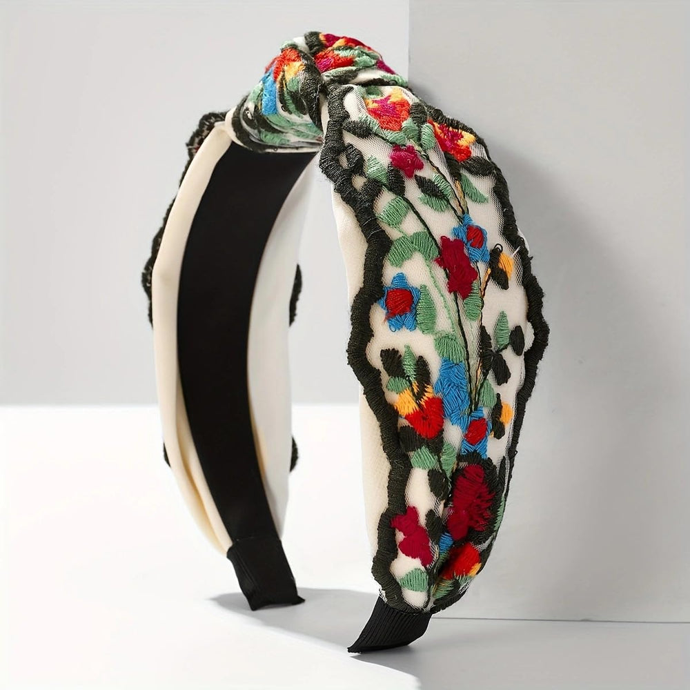 TURTLEDOVE headband held in hand shows size and portable convenience