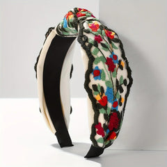 TURTLEDOVE headband held in hand shows size and portable convenience
