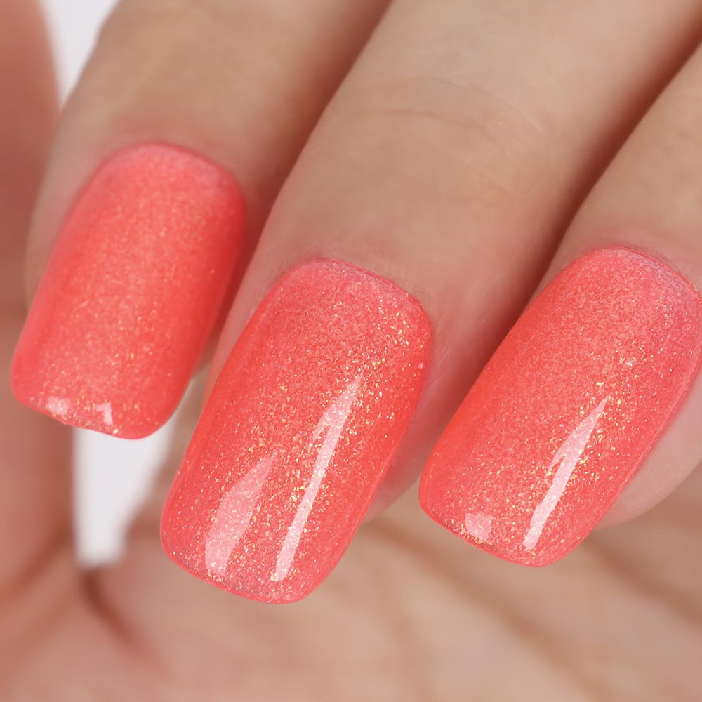 TUTUYU front bottle showing bright coral pink polish and brand clarity