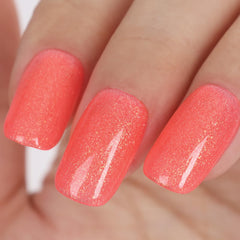 TUTUYU front bottle showing bright coral pink polish and brand clarity