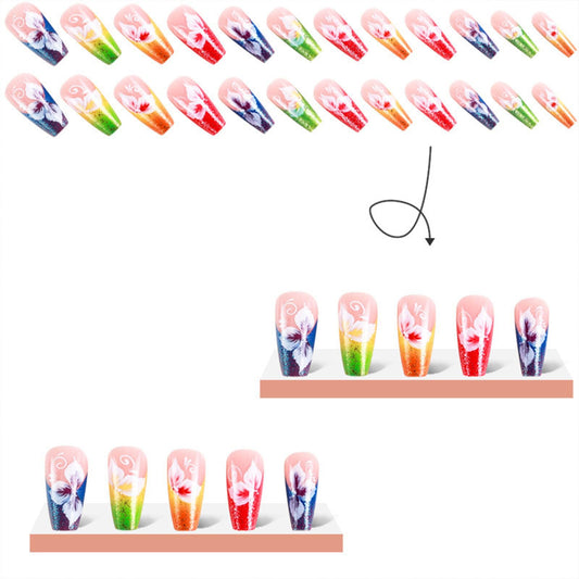 TUZANDW close-up of floral nail art, highlights delicate painted detail
