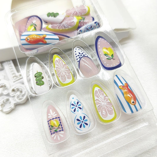 TUZANDW close-up of 3D tangerine fish and lemon designs highlighting summer style