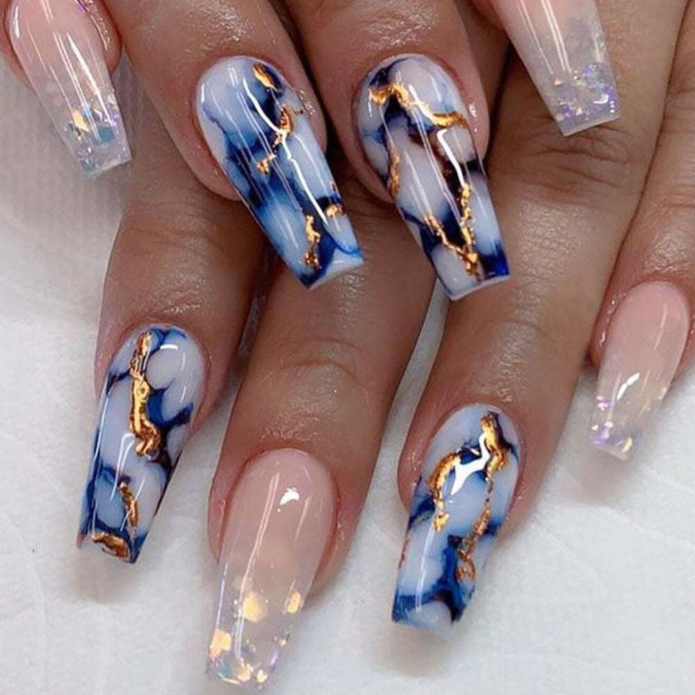 TUZANDW front packaging showing 24-piece glossy blue marble press-on nails, quick salon look