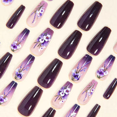 TUZANDW hand applying a press-on nail illustrating easy DIY application
