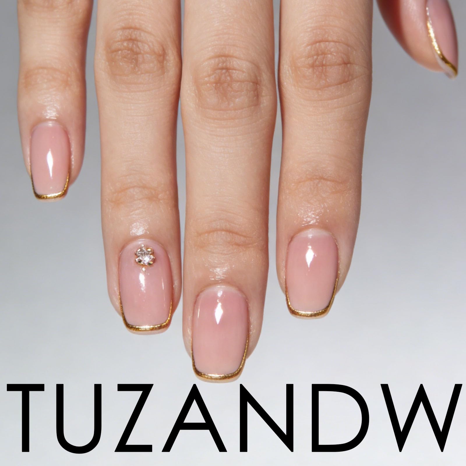 TUZANDW nails worn with sandals showing stylish ready-to-wear look