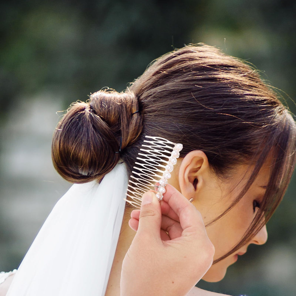 Tweruna two combs in bridal hairstyle adding symmetrical accent benefit