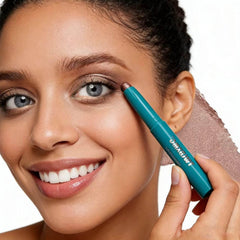 TWLBXMG eyeshadow stick travel flatlay showing portable makeup solution
