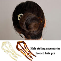 Twoheadpig used in a bridal updo in soft lighting showing elegance benefit: event-ready styling