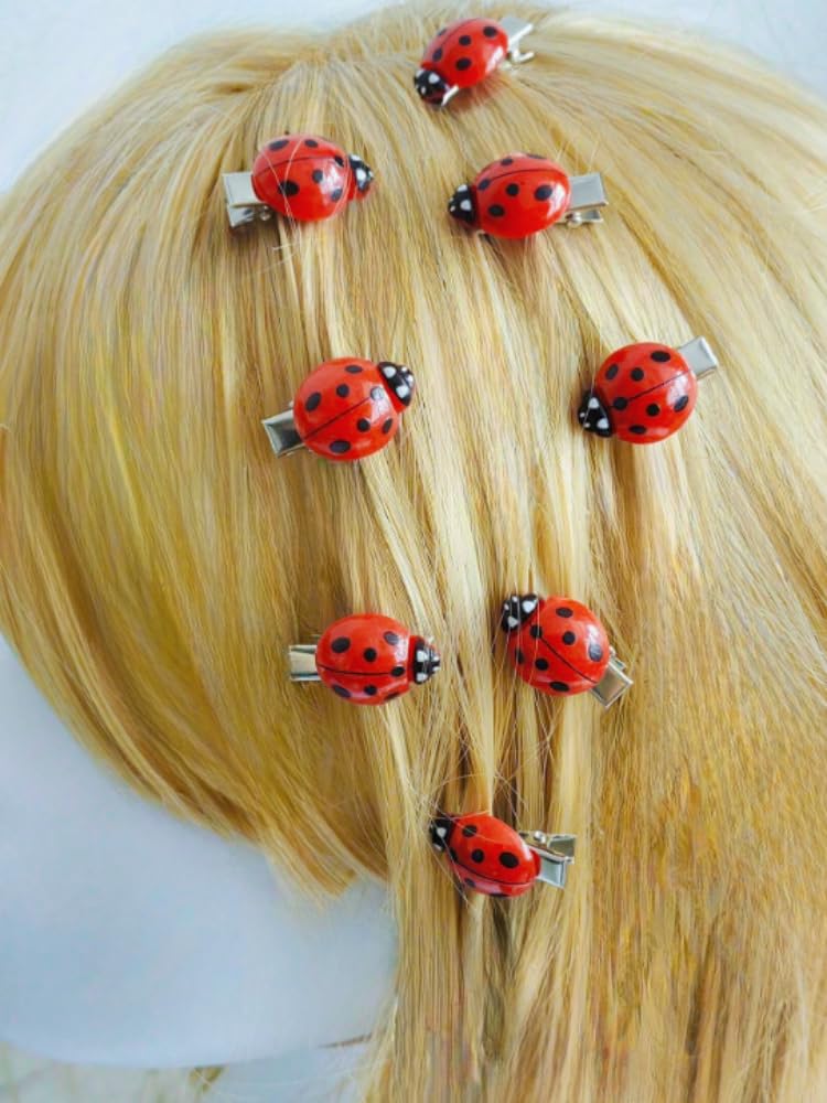 TYATVS single ladybug clipped to hat showing easy decoration benefit