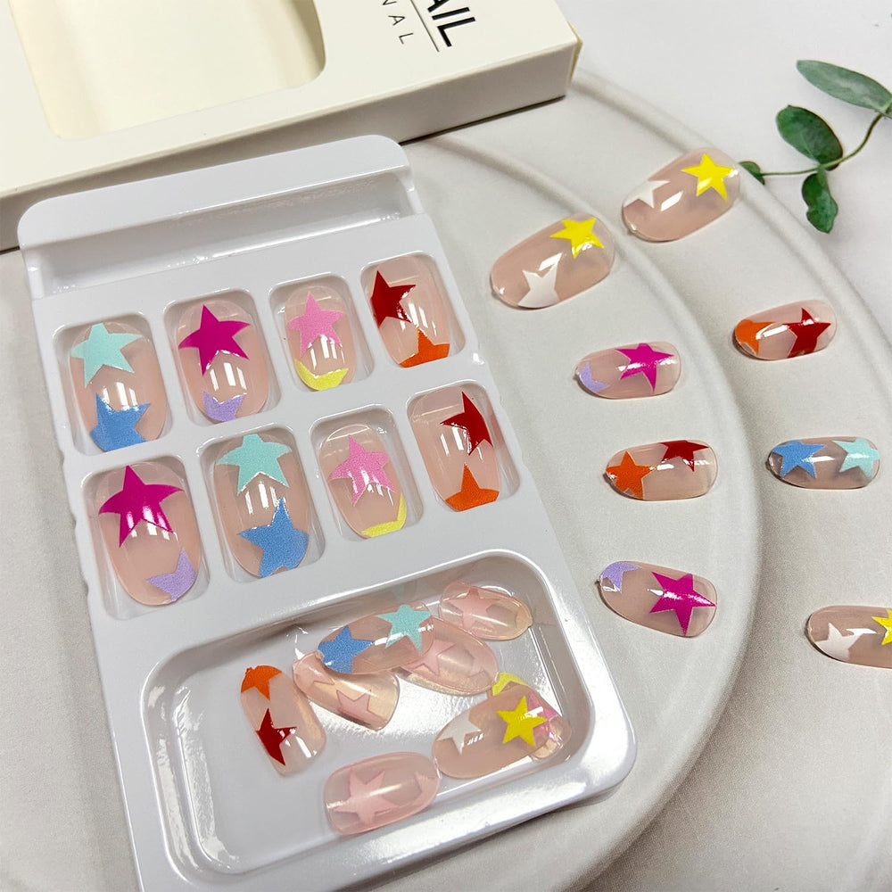 Tyuimhx hands applying a press-on nail with jelly glue, illustrating quick at-home application