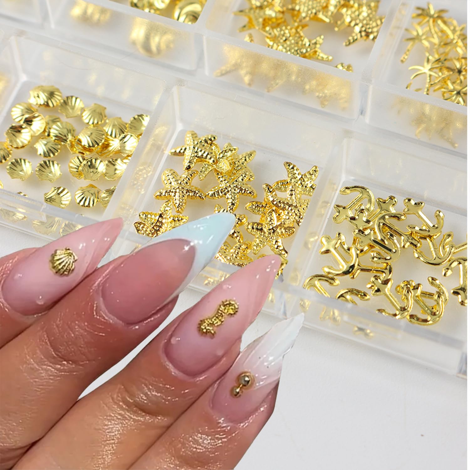Tyuimhx charms applied on acrylic nail demonstrating instant seaside manicure effect