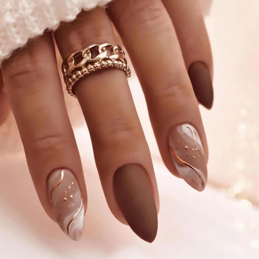 Tyuimhx front packaging showing brown matte nails with gold lines, ready to wear