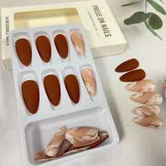 Tyuimhx press-on nails worn on hand, demonstrating instant polished manicure