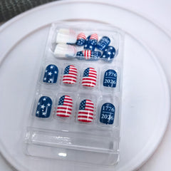 Tyuimhx model wearing nails at a Fourth of July celebration for festive look