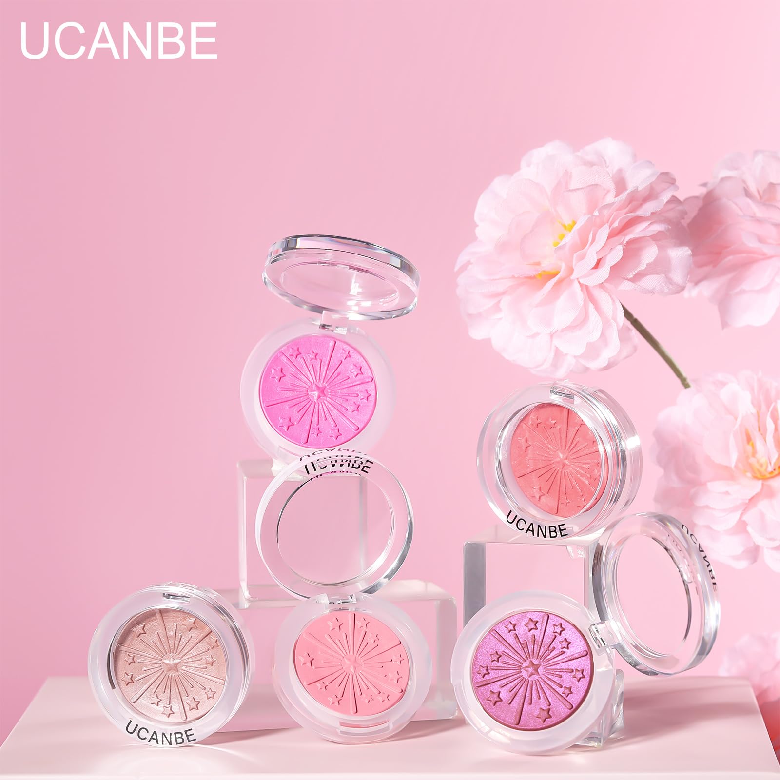 UCANBE palette next to coins showing compact size for travel-friendly use