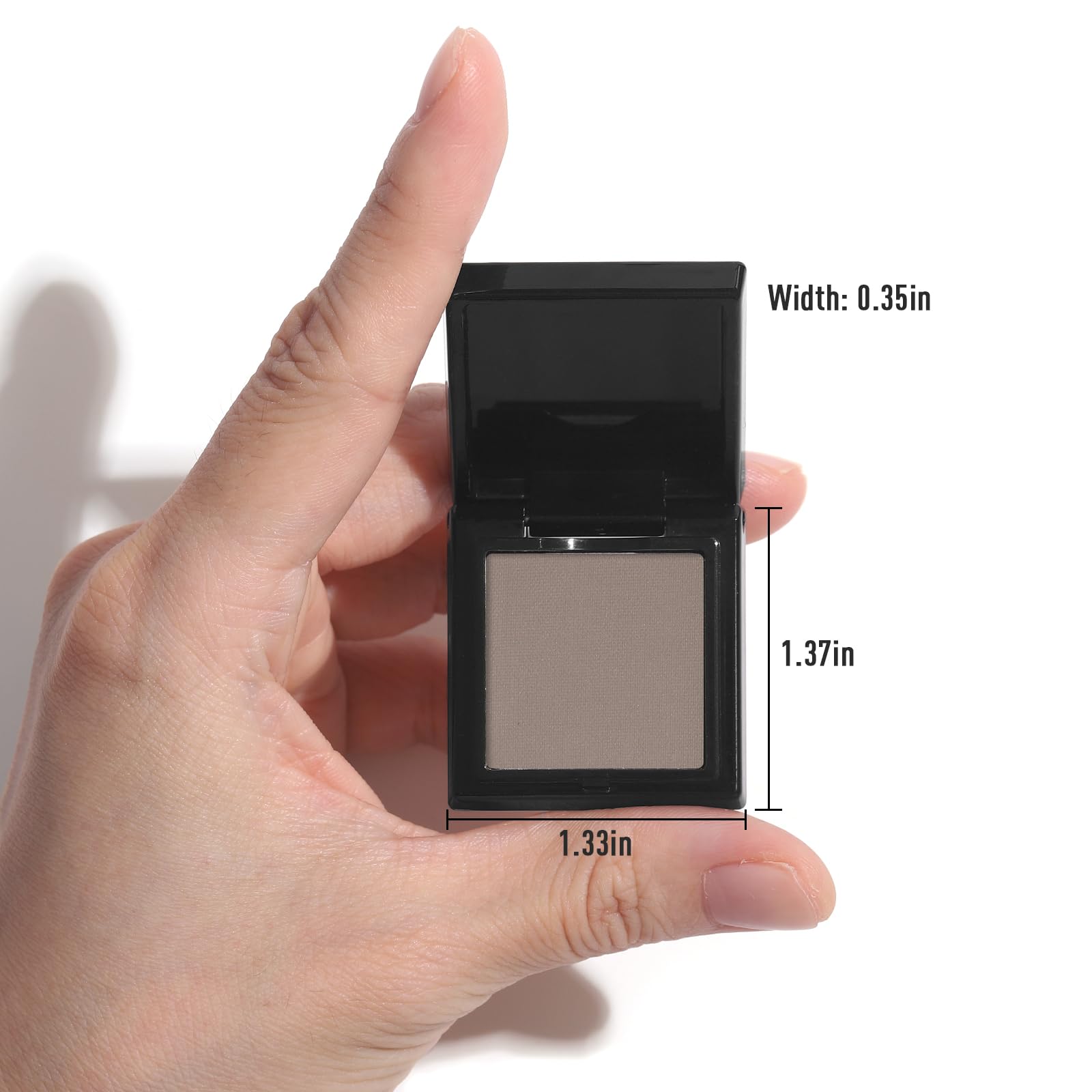 UCANBE palette next to hand showing compact size for on-the-go touch-ups