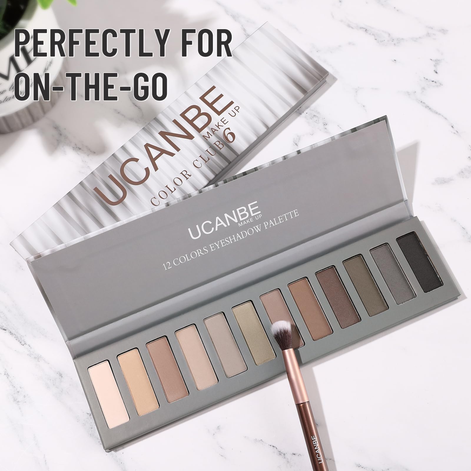 UCANBE palette held in hand to show compact size and travel convenience