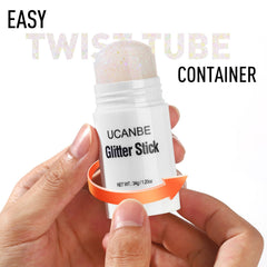 UCANBE stick with cap off showing cream-glitter texture for easy glide benefit