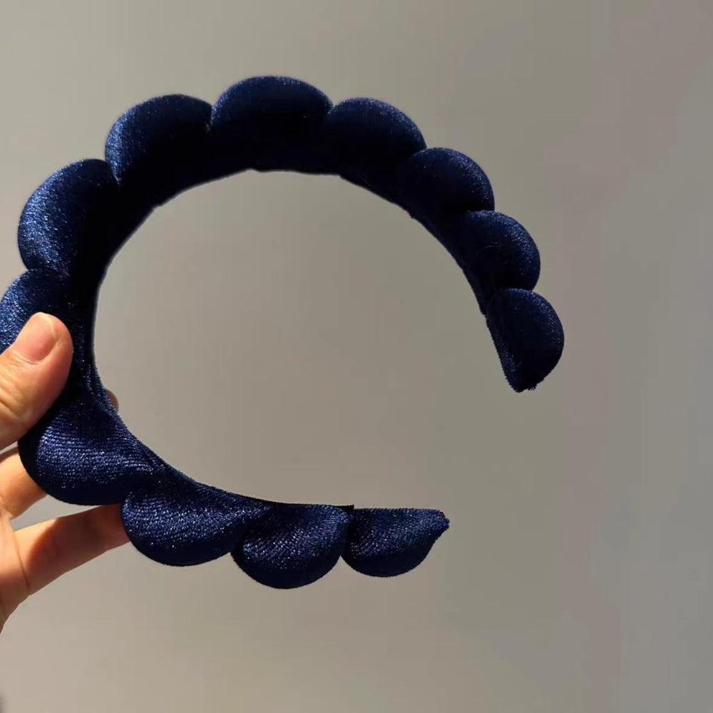Uchyius headband worn in hair demonstrating added volume and style