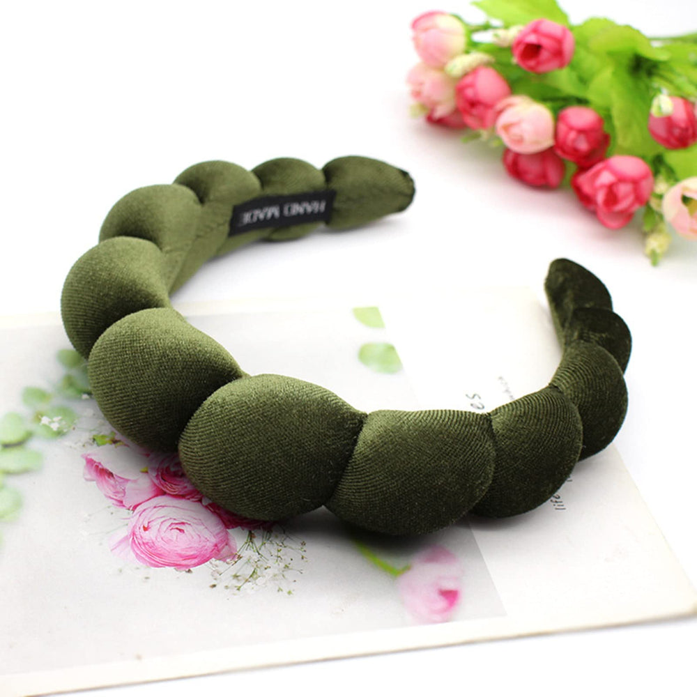 Uchyius headband worn outdoors showing secure non-slip hold