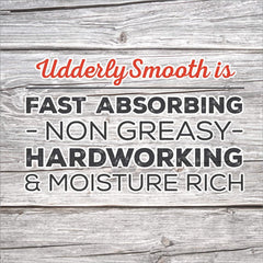 Udderly Smooth jar open showing creamy texture and quick absorption