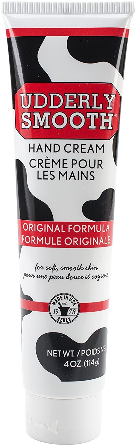 Udderly Smooth tube beside a coin showing 4 oz size for portability and value