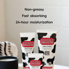 Udderly Smooth bundle held in hand illustrating travel-friendly size