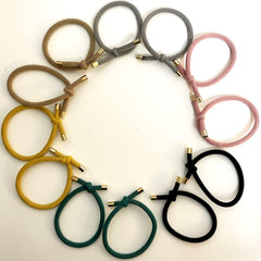 UDeBe hair tie in a ponytail demonstrating no-slip benefit during activity