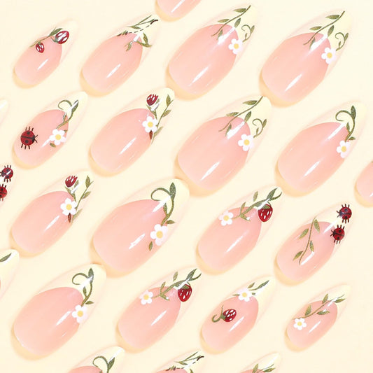 UEYRSEDB close-up of glossy almond nail texture highlighting smooth finish and natural look benefit