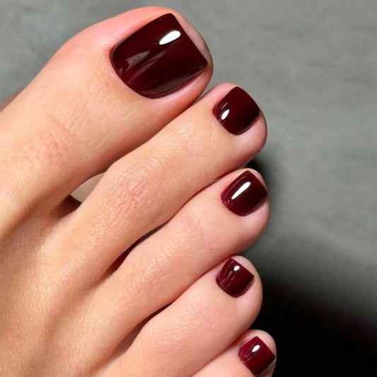 UEYRSEDB front packaging showing 24 wine red press on toenails, ready to wear