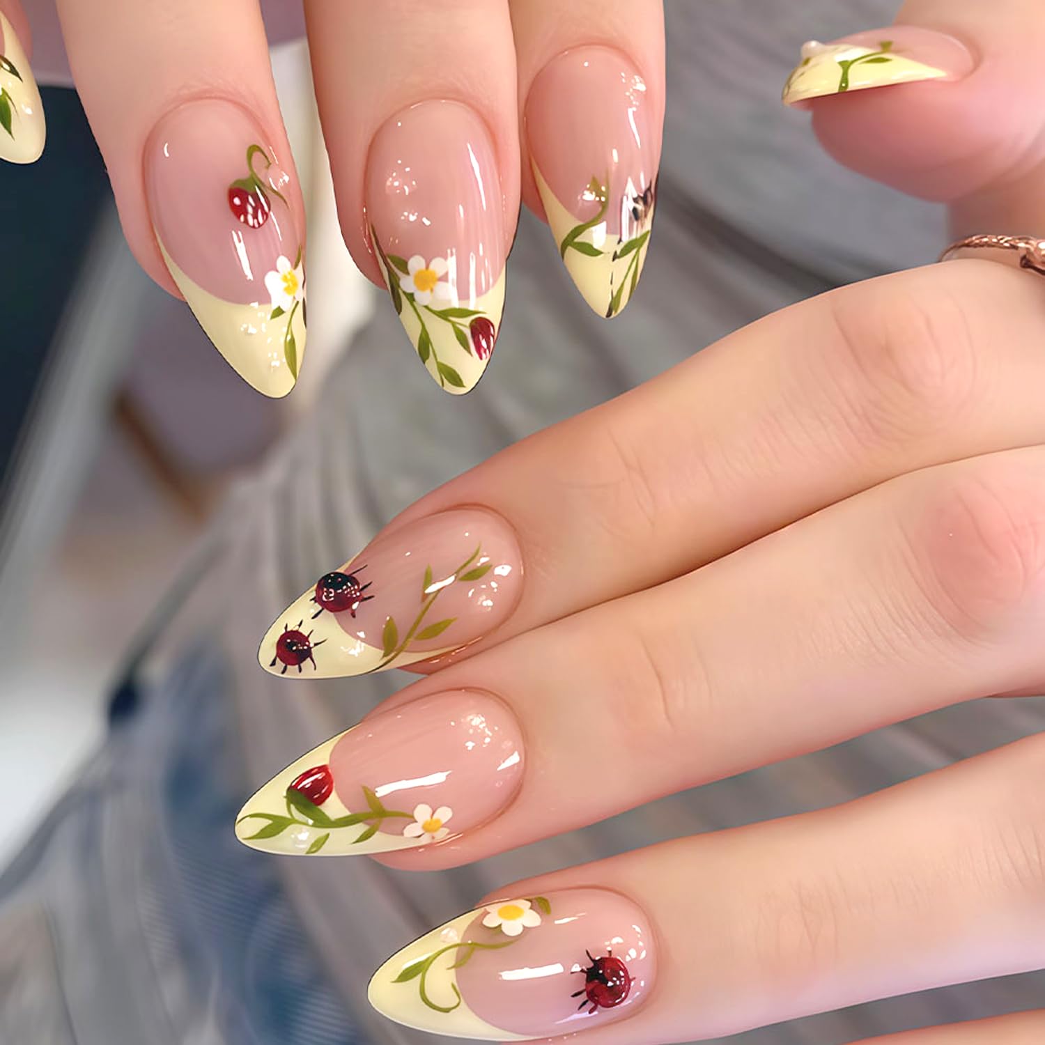 UEYRSEDB front packaging showing 24-piece yellow floral press-on nails and easy storage benefit